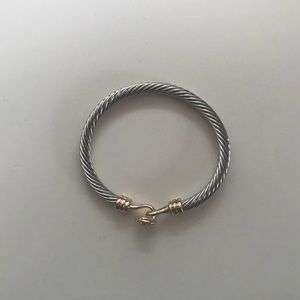 Silver bangle with gold and crystal clasp